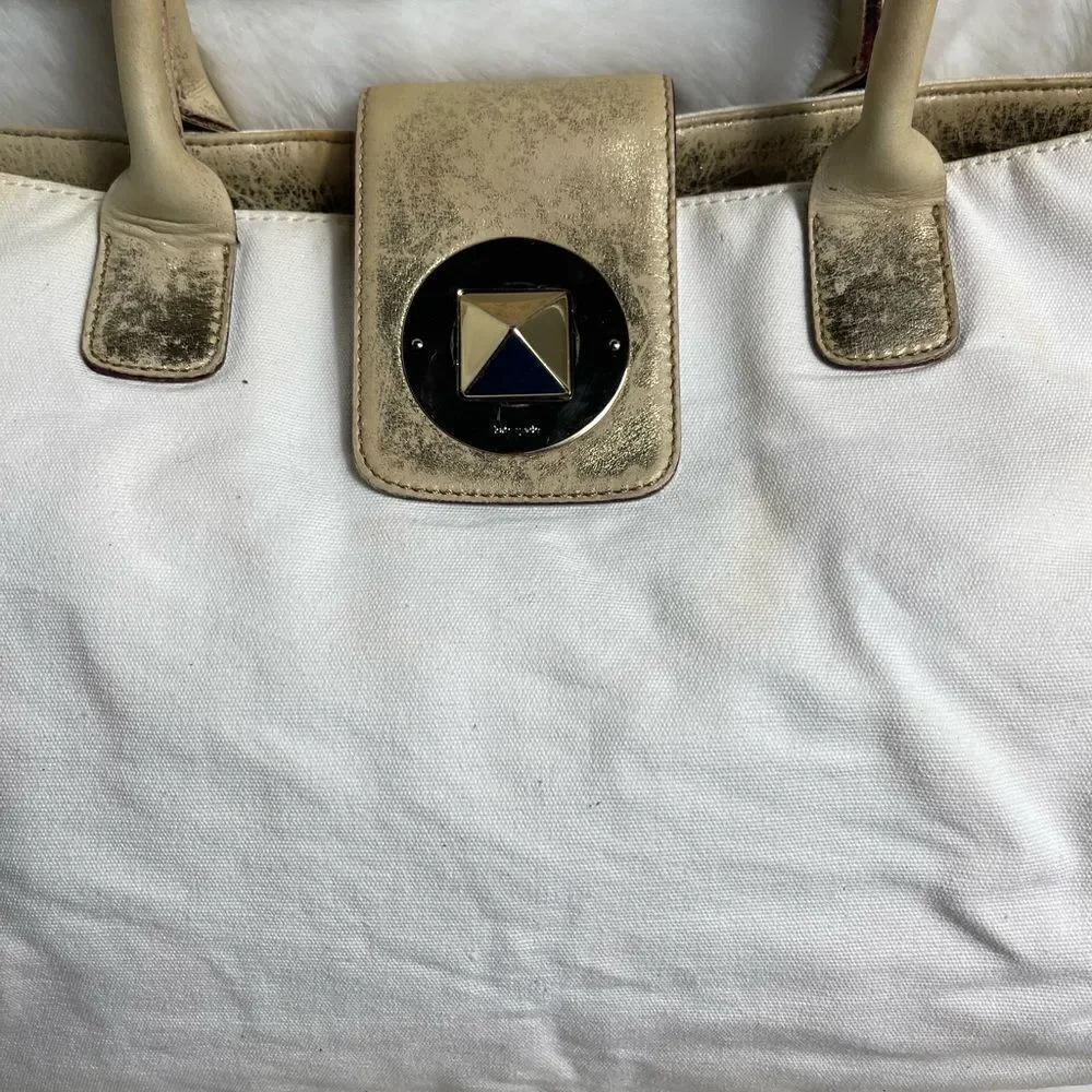 Vintage Kate spade beige canvas and faded gold trims shoulder bag.
